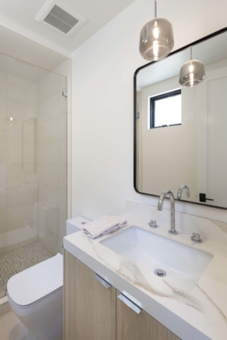 calacatta oro porcelain countertop bathroom
